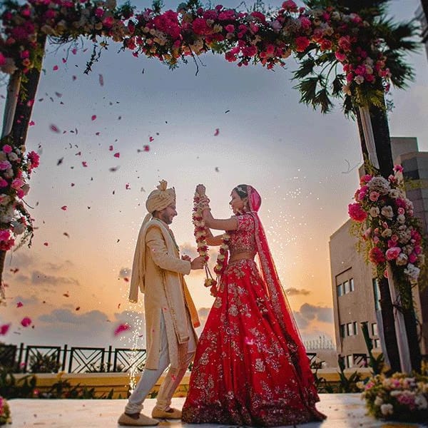 Shagun Wedding setup — elegant floral stage at night